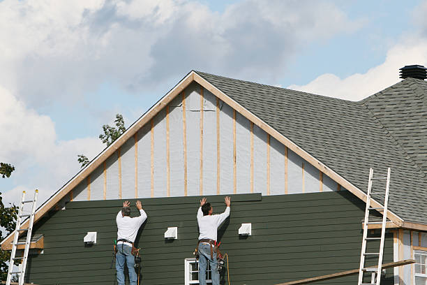 Professional Siding technician working in Armbrust, PA
